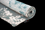 Louis de Poortere Sakura 9850 Lake Blue vloerkleed met een plooi, dun en soepel