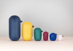 Normann Copenhagen Houten vogel Little Bird Geel in een interieur