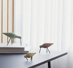 Normann Copenhagen Houten vogel Shorebird Lichtgroen in een interieur