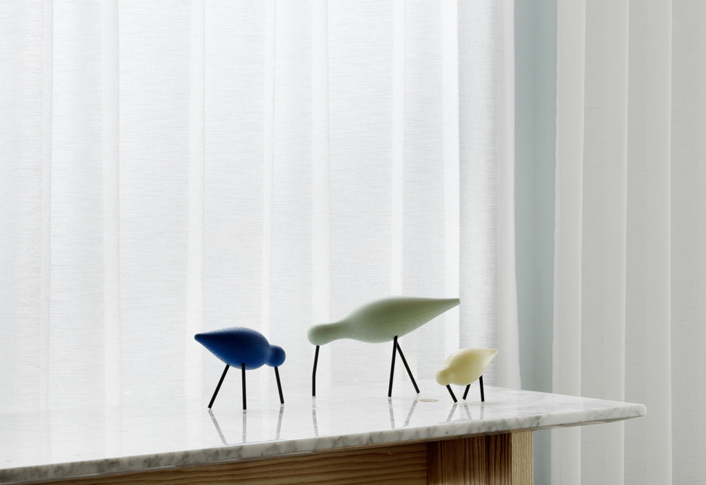 Normann Copenhagen Houten vogel Shorebird Lichtgroen in een interieur